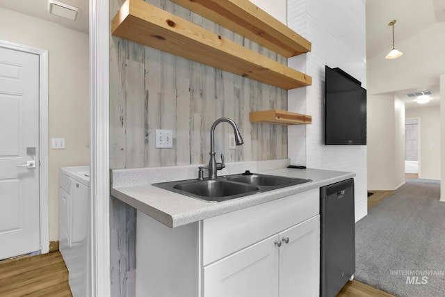 321 S Powerline Rd, Nampa, ID 83686 - kitchen featuring open shelves, dishwashing machine, washer and clothes dryer, white cabinets, and light countertops