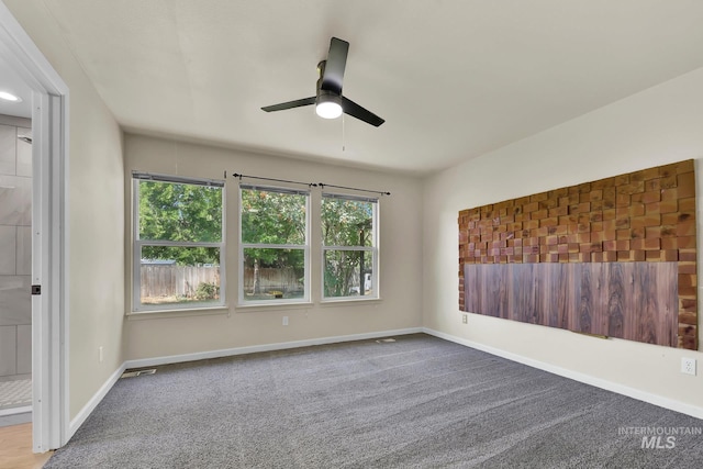 321 S Powerline Rd, Nampa, ID 83686 - carpeted empty room with ceiling fan and baseboards