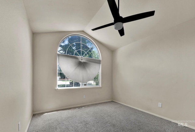 321 S Powerline Rd, Nampa, ID 83686 - carpeted empty room featuring vaulted ceiling, plenty of natural light, and a ceiling fan