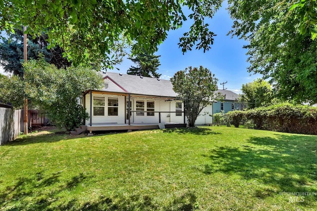 321 S Powerline Rd, Nampa, ID 83686 - rear view of property with a wooden deck
