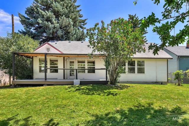 321 S Powerline Rd, Nampa, ID 83686 - back of house with a lawn and covered porch