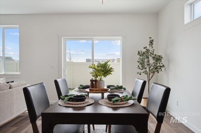 6303 W Pewter Point St, Meridian, ID 83646 - dining space with baseboards and wood finished floors