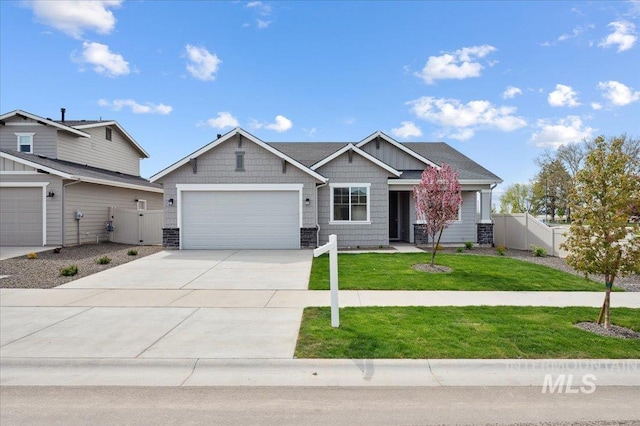 6303 W Pewter Point St, Meridian, ID 83646 - craftsman inspired home with a garage, concrete driveway, and a gate