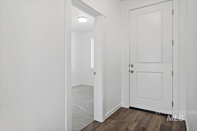 6303 W Pewter Point St, Meridian, ID 83646 - corridor with dark wood-style floors and baseboards