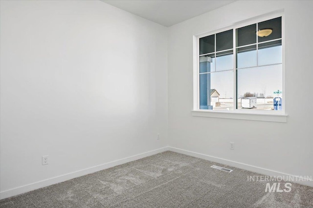 6303 W Pewter Point St, Meridian, ID 83646 - carpeted spare room featuring baseboards