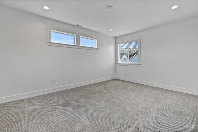 11844 N 21st Ave, Boise, ID 83714 - spare room featuring carpet floors, baseboards, and recessed lighting