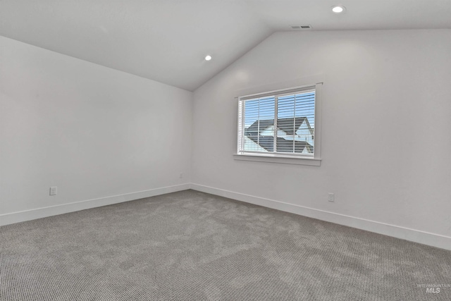 11844 N 21st Ave, Boise, ID 83714 - empty room with vaulted ceiling, carpet flooring, baseboards, and recessed lighting