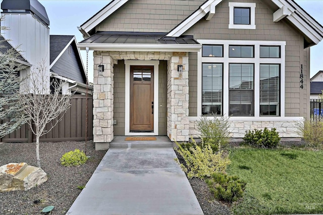 11844 N 21st Ave, Boise, ID 83714 - property entrance with stone siding, a standing seam roof, and metal roof