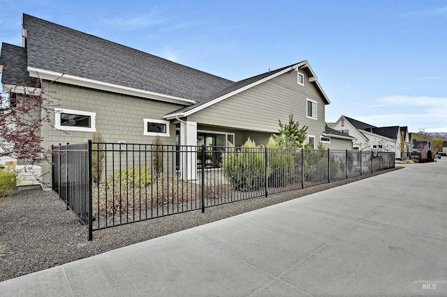 11844 N 21st Ave, Boise, ID 83714 - view of home's exterior with a shingled roof