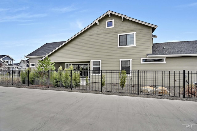 11844 N 21st Ave, Boise, ID 83714 - rear view of property featuring roof with shingles