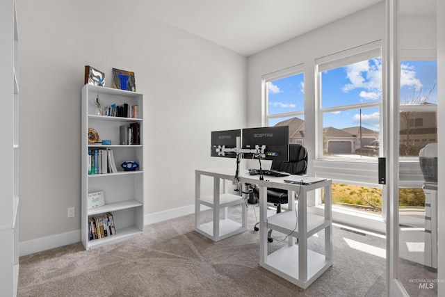 home office with light colored carpet