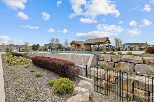 view of swimming pool featuring a gazebo