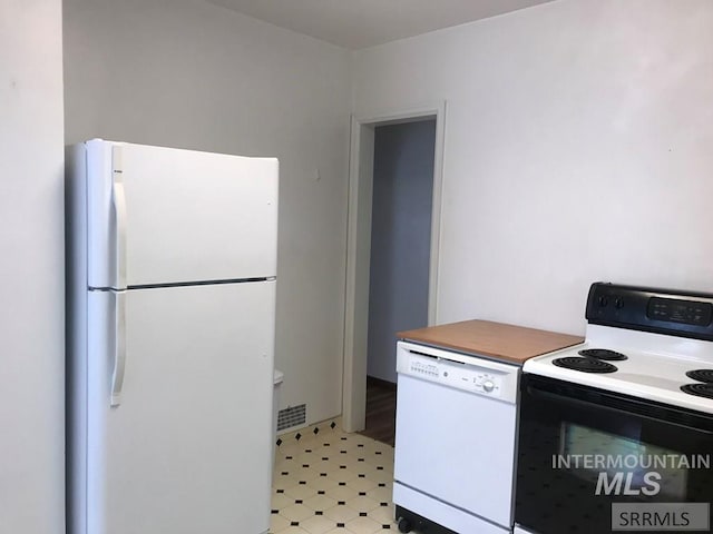 kitchen featuring white appliances