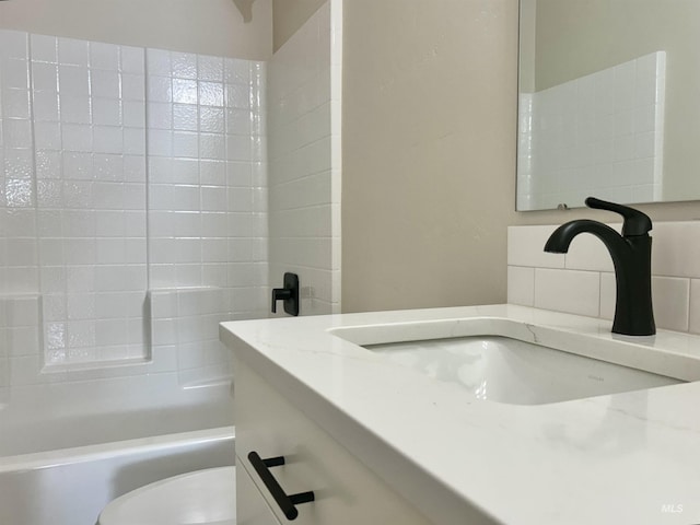 full bath with vanity, shower / tub combination, and toilet