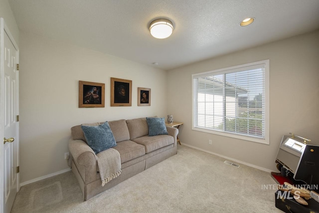 3411 Wilson Ln, Nampa, ID 83686 - living area featuring baseboards, carpet, and recessed lighting