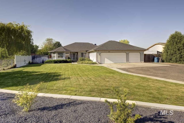 3411 Wilson Ln, Nampa, ID 83686 - ranch-style house with a garage and concrete driveway