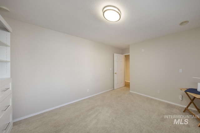 3411 Wilson Ln, Nampa, ID 83686 - bedroom featuring light colored carpet and baseboards