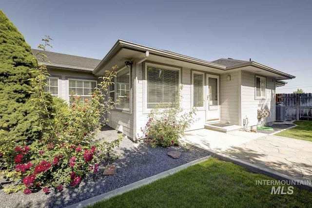 3411 Wilson Ln, Nampa, ID 83686 - view of front facade with a patio area and central AC unit