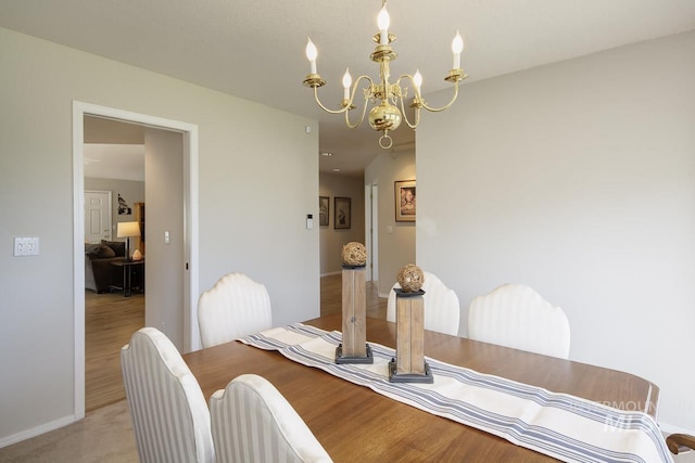 3411 Wilson Ln, Nampa, ID 83686 - dining area with a chandelier and light wood finished floors