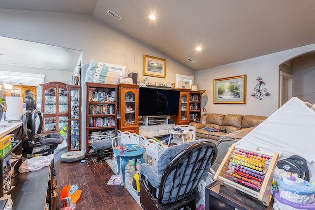 3744 S Antler Rdg, Boise, ID 83709 - living area featuring lofted ceiling, hardwood / wood-style floors, arched walkways, and recessed lighting