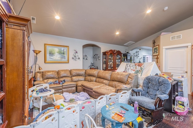 3744 S Antler Rdg, Boise, ID 83709 - living area featuring vaulted ceiling, recessed lighting, arched walkways, and wood finished floors