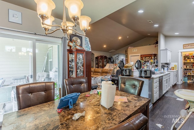 3744 S Antler Rdg, Boise, ID 83709 - dining space featuring dark wood-style flooring, a chandelier, vaulted ceiling, and recessed lighting