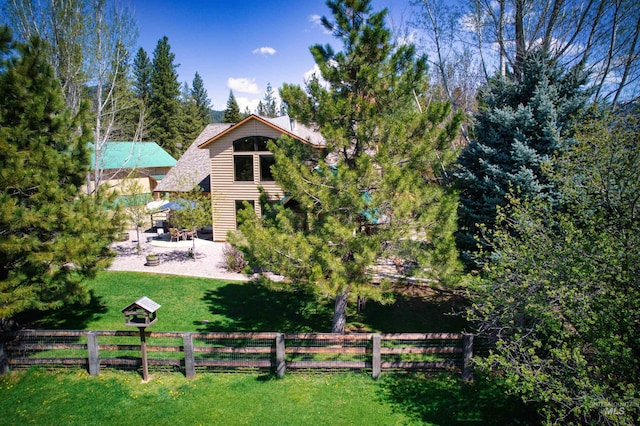 back of property with a patio