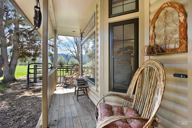 wooden terrace with covered porch