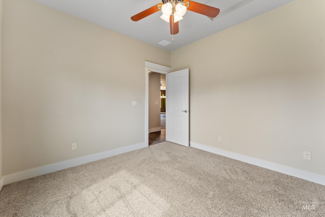 1031 E Reflect Ridge Dr, Meridian, ID 83642 - carpeted spare room featuring a ceiling fan and baseboards
