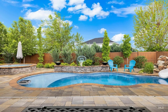 5853 W Venetian Dr, Eagle, ID 83616 - view of swimming pool featuring an outdoor hot tub, a fenced backyard, and a patio area