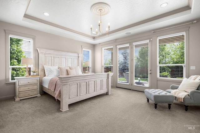 5853 W Venetian Dr, Eagle, ID 83616 - bedroom featuring a tray ceiling, access to exterior, light carpet, and recessed lighting