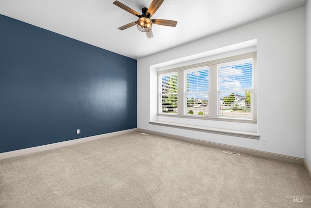 5853 W Venetian Dr, Eagle, ID 83616 - carpeted spare room featuring baseboards and ceiling fan