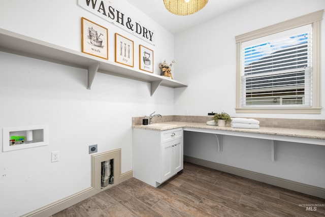 5853 W Venetian Dr, Eagle, ID 83616 - washroom featuring hookup for an electric dryer, washer hookup, dark wood-style floors, and cabinet space
