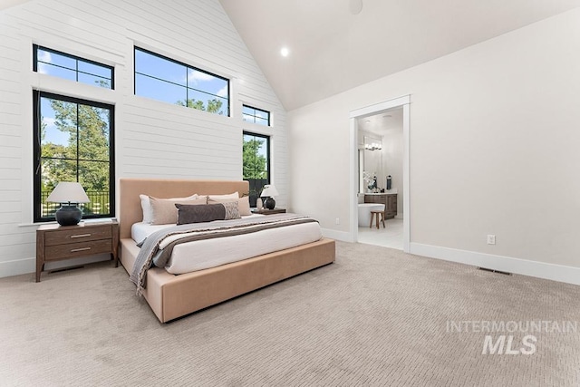 1195 N Arrano Farms Ln, Eagle, ID 83616 - bedroom with high vaulted ceiling, light carpet, baseboards, and recessed lighting