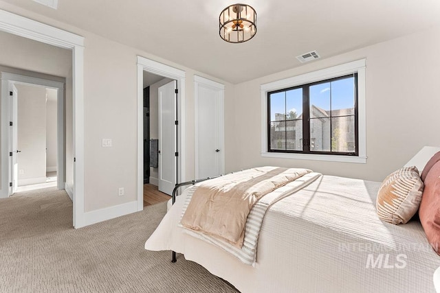 1195 N Arrano Farms Ln, Eagle, ID 83616 - bedroom with light carpet and baseboards