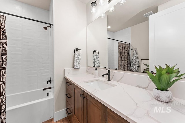1195 N Arrano Farms Ln, Eagle, ID 83616 - bathroom featuring vanity and shower / bath combo with shower curtain