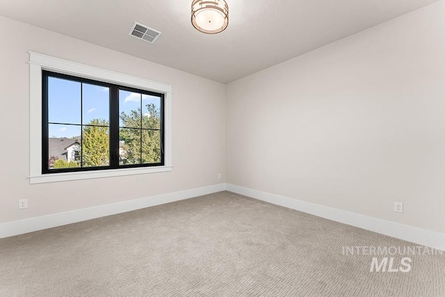 1195 N Arrano Farms Ln, Eagle, ID 83616 - carpeted spare room featuring baseboards
