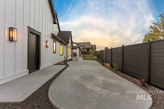 1195 N Arrano Farms Ln, Eagle, ID 83616 - patio terrace at dusk featuring a patio