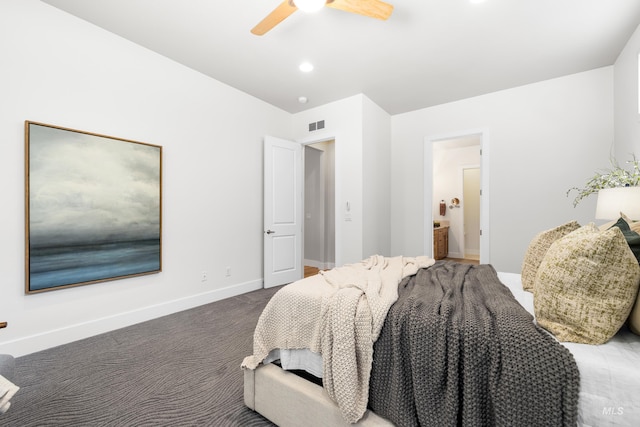 bedroom featuring carpet flooring, ensuite bath, a ceiling fan, baseboards, and visible vents