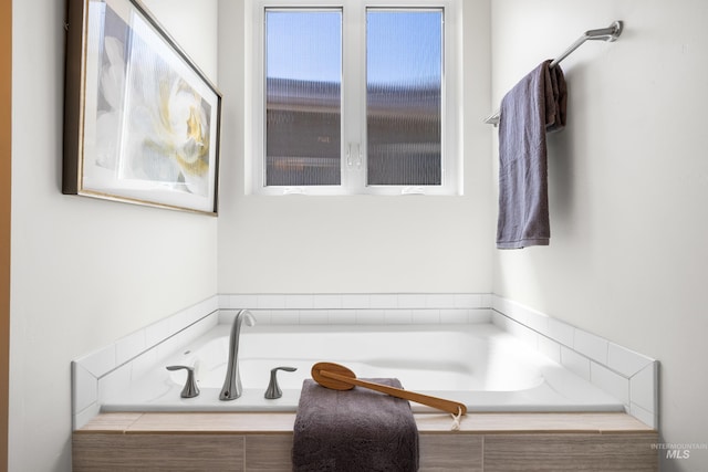 full bathroom featuring a garden tub