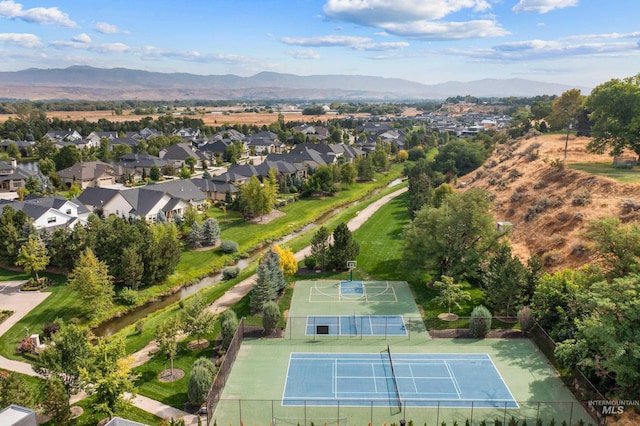 birds eye view of property with a residential view and a mountain view