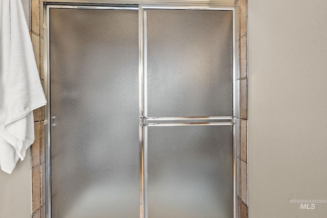 bathroom with a stall shower