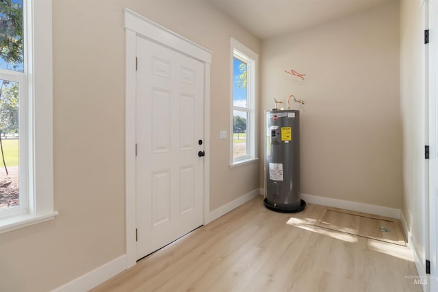4320 SW 2nd Ave, New Plymouth, ID 83655 - foyer with water heater, wood finished floors, and plenty of natural light
