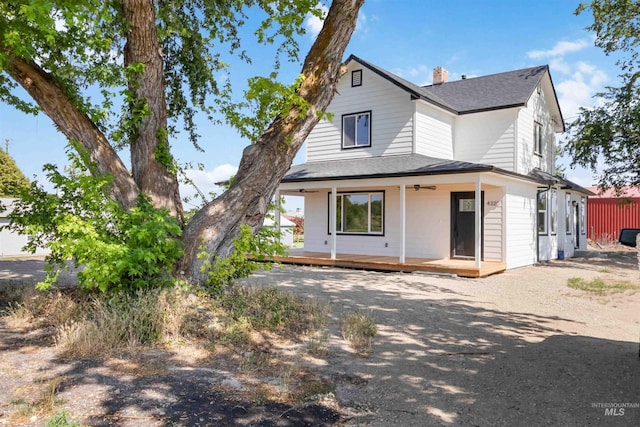 4320 SW 2nd Ave, New Plymouth, ID 83655 - farmhouse-style home with roof with shingles and a chimney