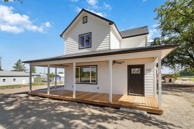 4320 SW 2nd Ave, New Plymouth, ID 83655 - rear view of house featuring ceiling fan and a shingled roof