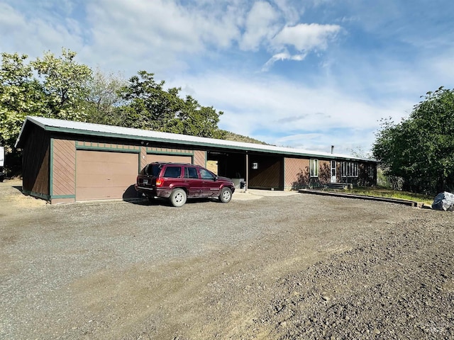 245 W 3rd St, Huntington, OR 97907 - view of front of home featuring driveway and a carport