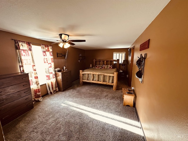 245 W 3rd St, Huntington, OR 97907 - carpeted bedroom with a ceiling fan