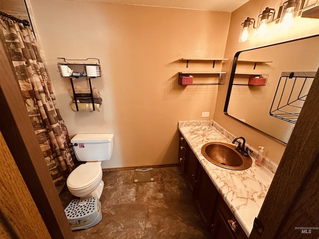 245 W 3rd St, Huntington, OR 97907 - bathroom featuring toilet, vanity, baseboards, and curtained shower