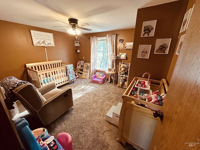 245 W 3rd St, Huntington, OR 97907 - bedroom with carpet, a nursery area, and ceiling fan