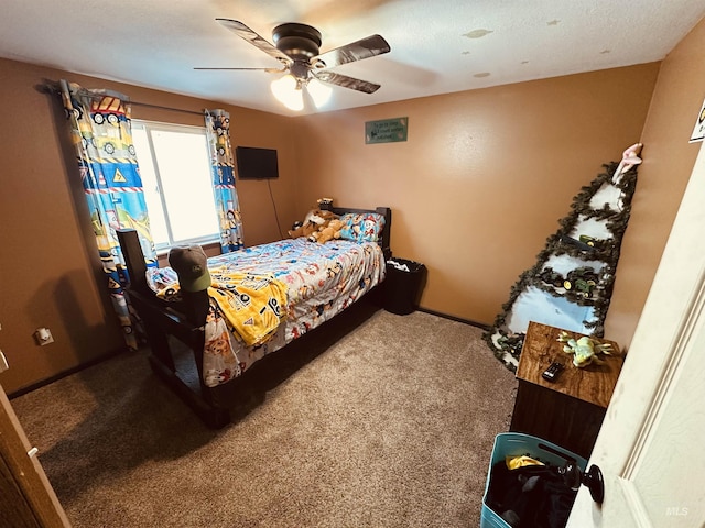 245 W 3rd St, Huntington, OR 97907 - carpeted bedroom featuring ceiling fan and baseboards